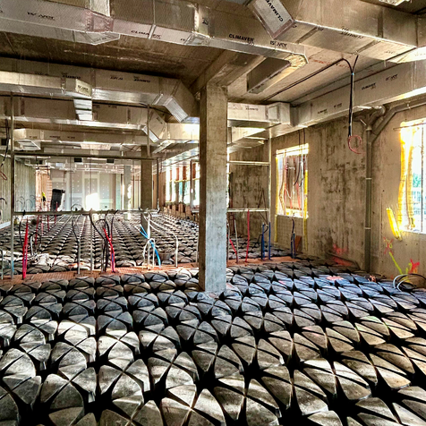Concreting of a cavity floor slab with cavity vaults at the FUB University Clinic.